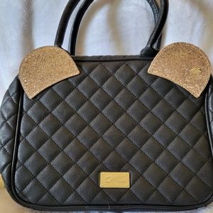A Bestey Johnson, black make up purse
